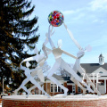Custom stainless steel abstract metal figure playing with ball sculpture